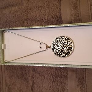 38 inch adjustable silver and black enamel necklace made by Scroll & Vine.